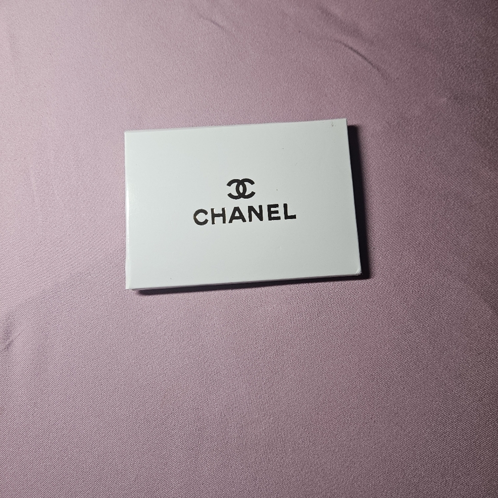 CHANEL Cream Card Holder with Silver Accent